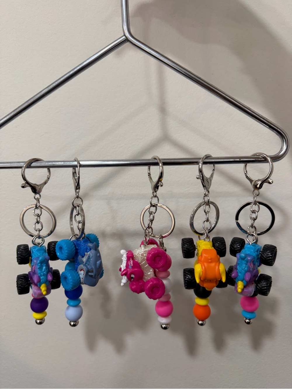 Colorful Monster Truck Keychain Set for Kids - Blue, Pink, Orange, Purple